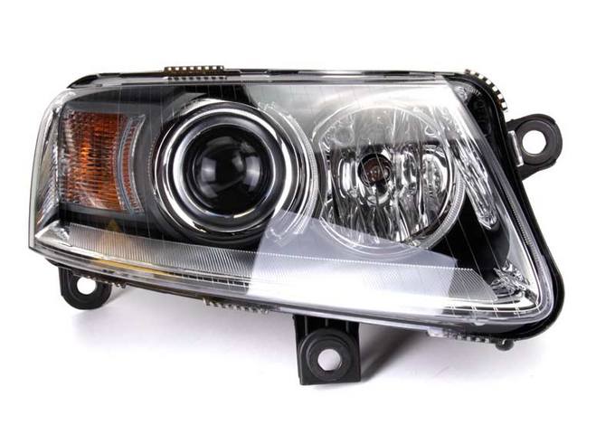 Audi Headlight Assembly - Passenger Side (Xenon) 4F0941030ED - Hella 008881461